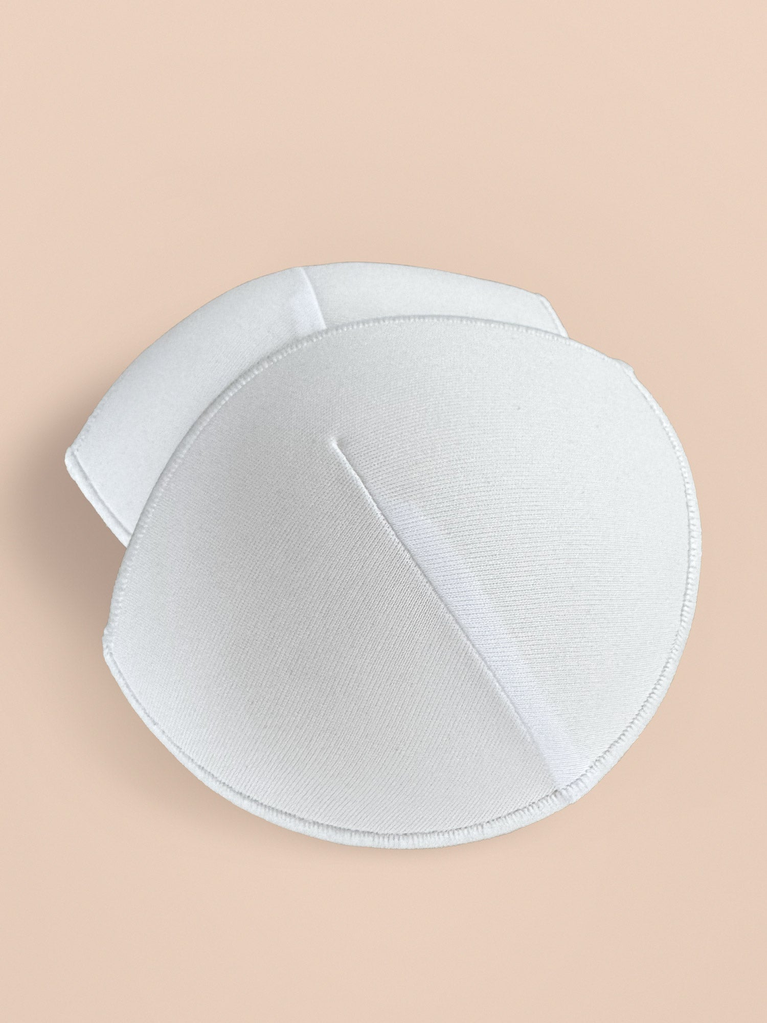 Bra inserts - Thick cloth-covered 2 inch foam pads for push-up effect and added volume.
