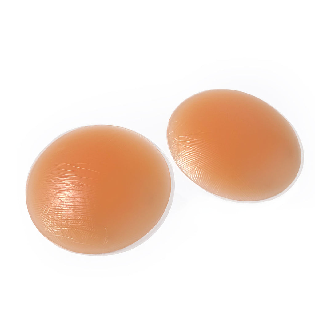 Silicone Butt Pads in a natural skin tone, showcasing soft and squishy texture for realistic booty padding.